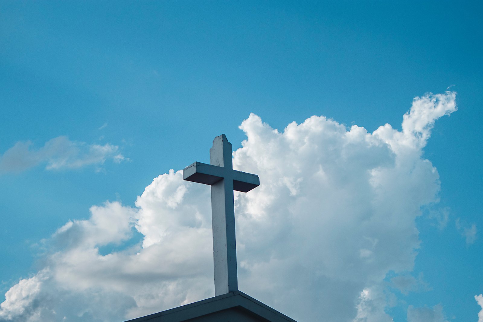 A cross against an open sky