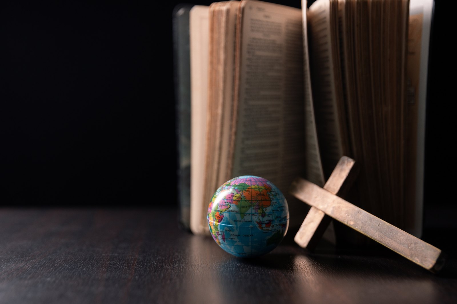 A Bible, globe and cross for the mission of the church